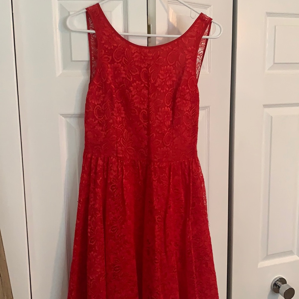 Red lace knee length dress low v back